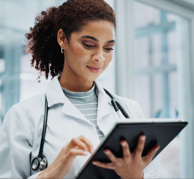 Tablet, woman and doctor with telehealth, networking and reading info at hospital with tech. Digital, research and online medical advice with clinic app for planning and results for web consultation